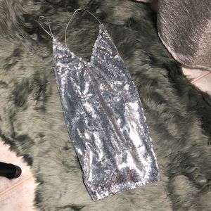 Sexy and flirty sequined mini dress or long top